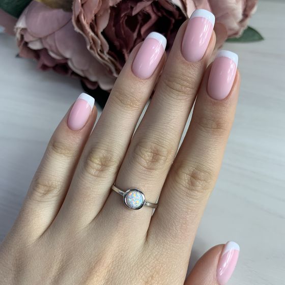 Silver ring with an opal
