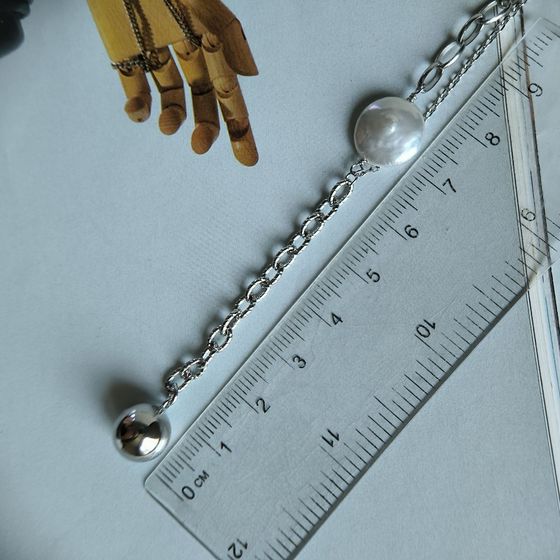 Silver necklace with baroque pearls