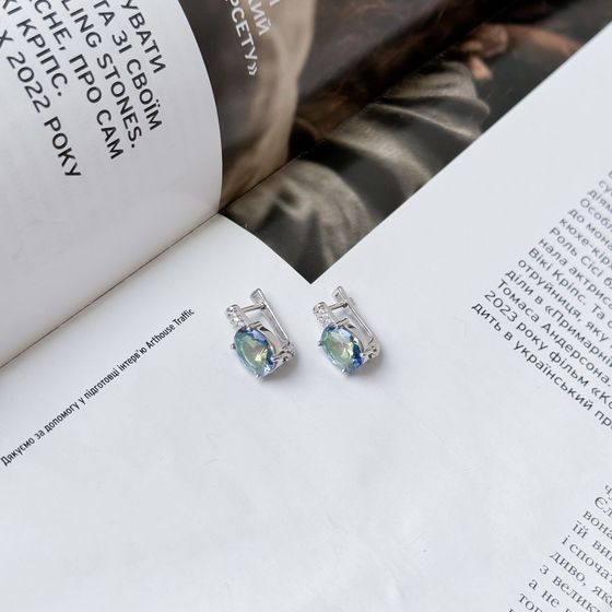 Silver earrings with a 3.817-carat mystic topaz