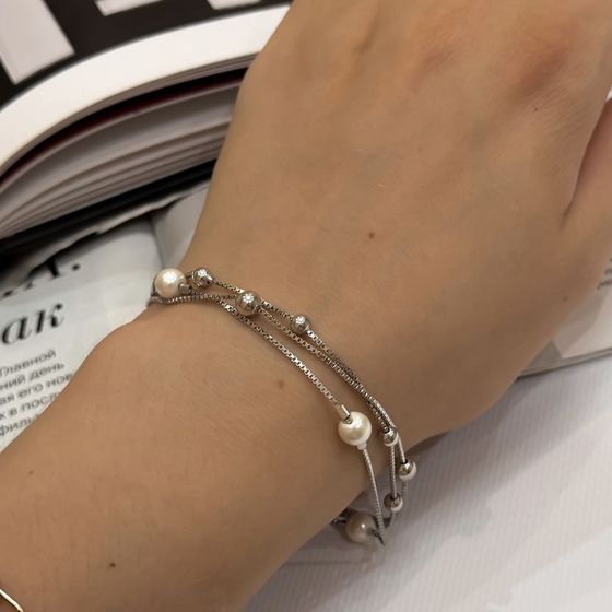 Silver bracelet with pearls