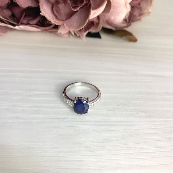 Silver ring with a sapphire