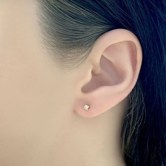 Золоті сережки з діамантом 0.12ct