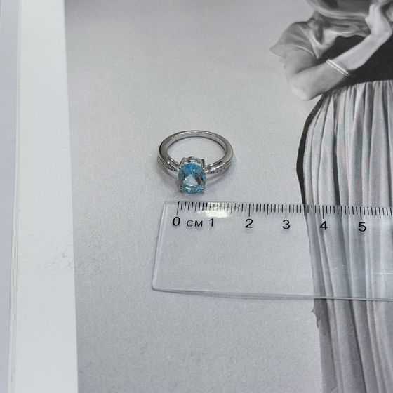 Silver ring with a topaz