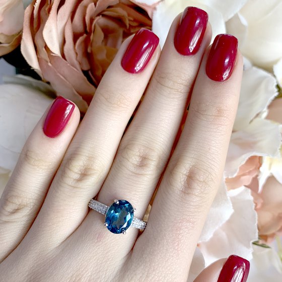 Срібна каблучка з топазом Лондон Блю