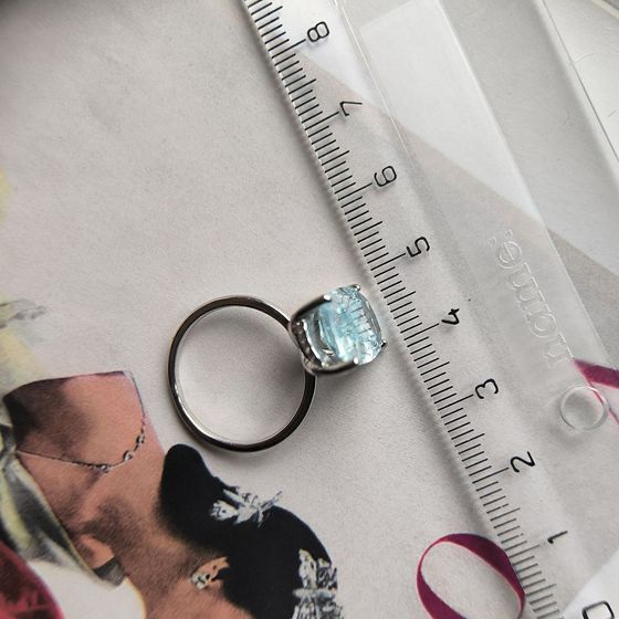 Silver ring with topaz