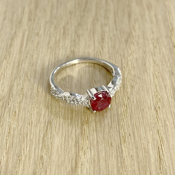 Silver ring with a ruby