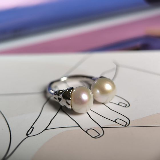 Silver ring with baroque pearls