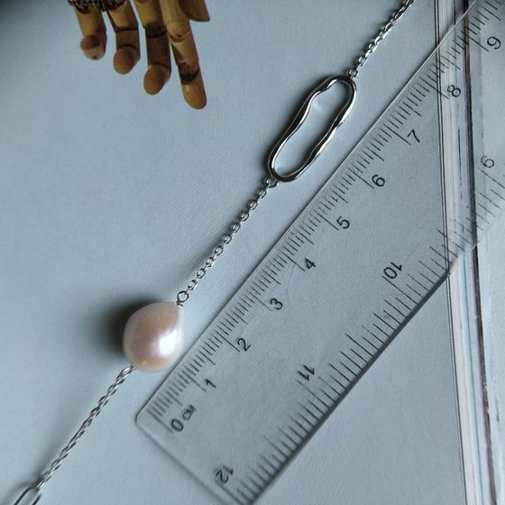 Silver necklace with baroque pearls