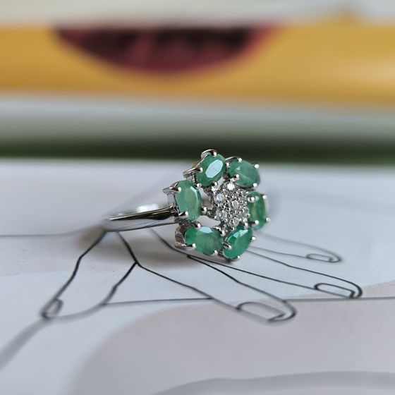 Silver ring with emerald, fianites