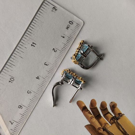 Silver earrings with topaz, fianites