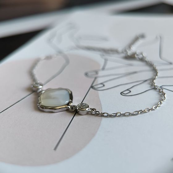 Silver bracelet with mother-of-pearl, phyanites