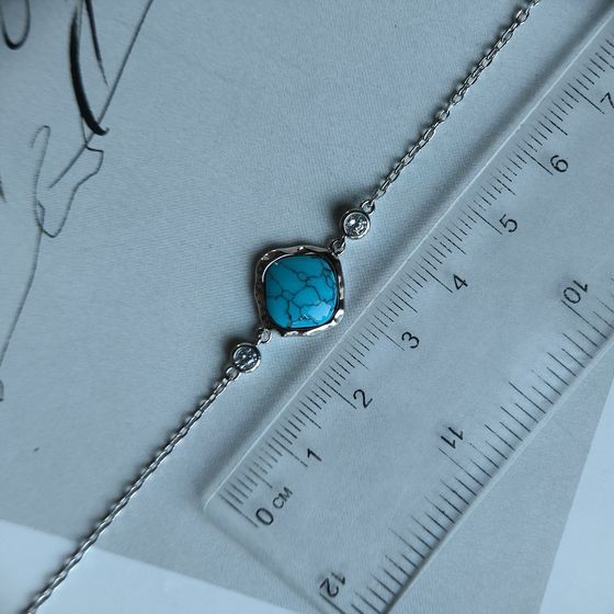 Silver bracelet with turquoise, fianites