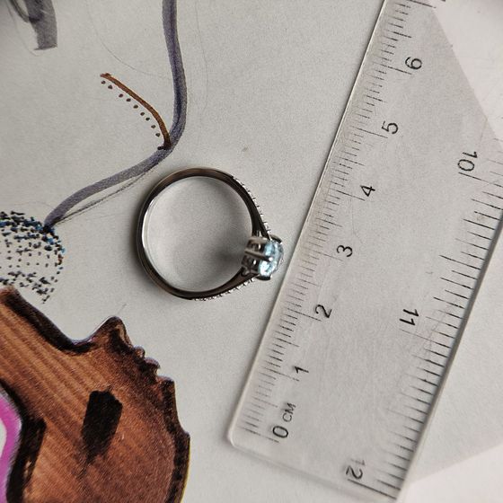 Срібна каблучка з топазом 1.402ct, фіанітами