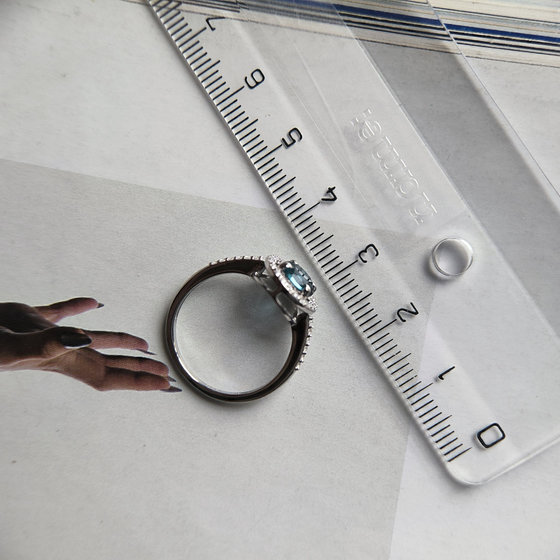 Silver ring with London Blue topaz and cubic zirconia