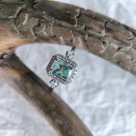 Silver ring with mystic topaz