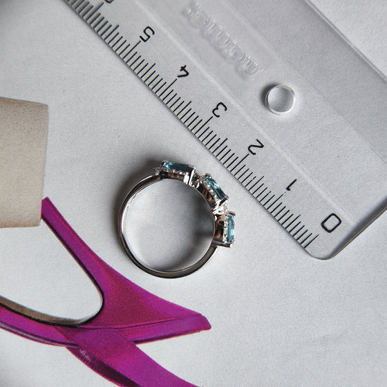 Silver ring with London Blue topaz and cubic zirconia