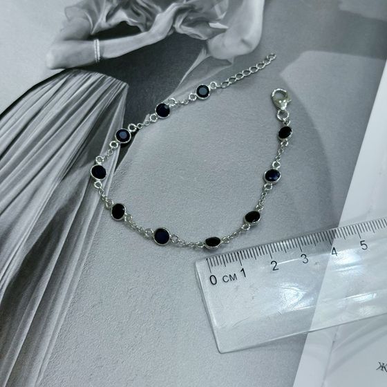 Silver bracelet with a sapphire