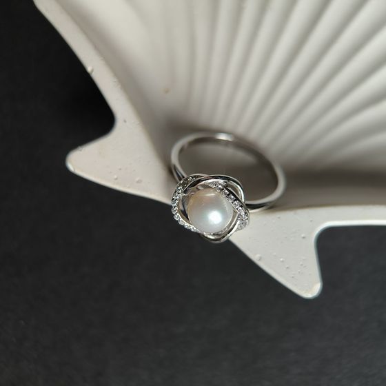 Silver ring with pearls