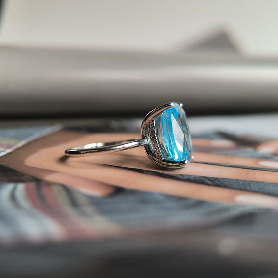 Silver ring with topaz