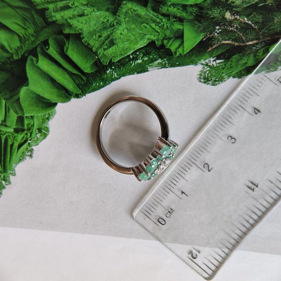 Silver ring with emerald, fianites
