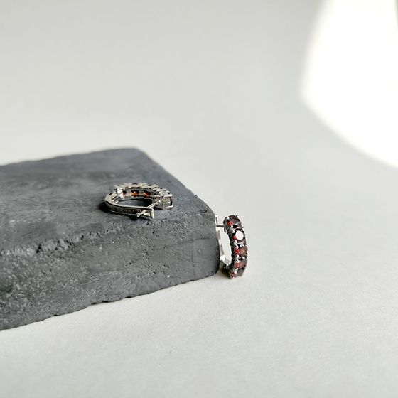 Silver earrings with a 3.2-carat garnet