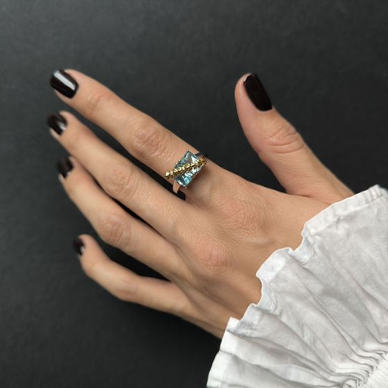 Silver ring with topaz, fianites