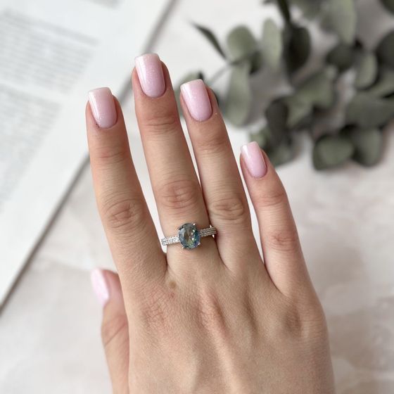 Silver ring with mystic topaz