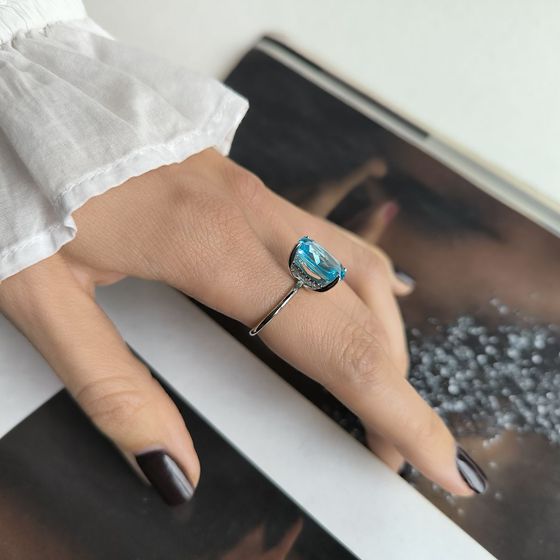 Silver ring with topaz