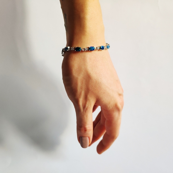Silver bracelet with opal, fianites