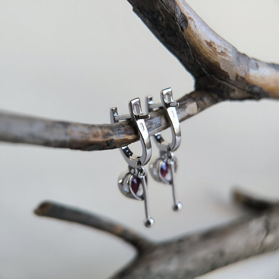 Silver earrings with 2.4ct ruby and cubic zirconia
