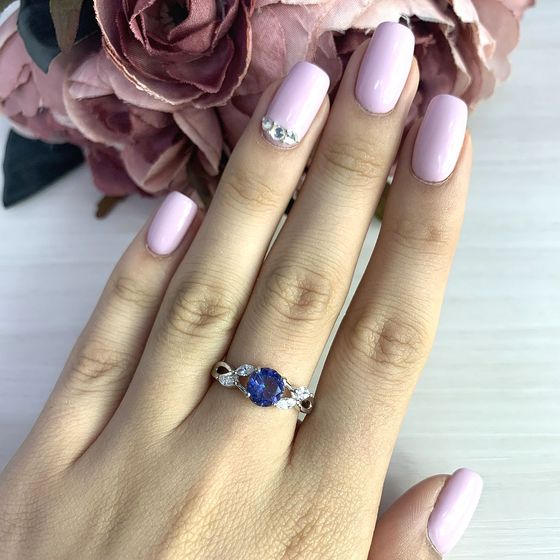Silver ring with a 1.385-carat mystic topaz