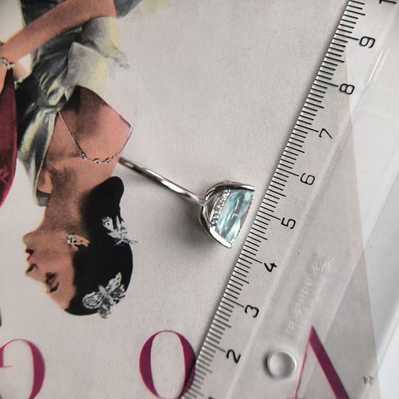 Silver ring with topaz