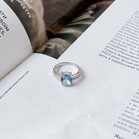 Silver ring with mystic topaz
