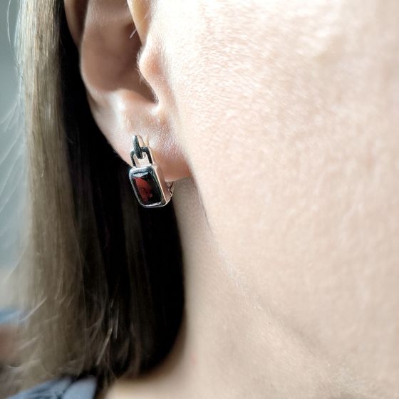 Silver earrings with a 3.81-carat garnet