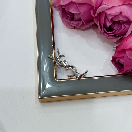 Silver brooch without stones