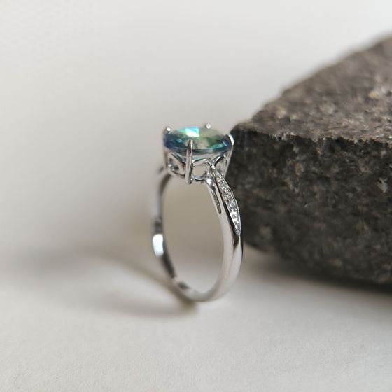 Silver ring with mystic topaz