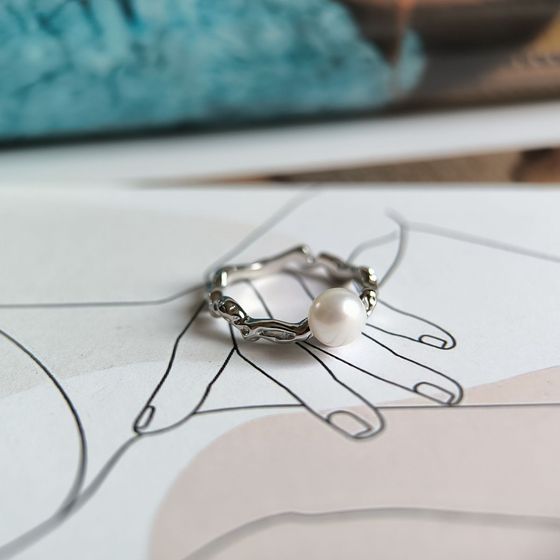 Silver ring with pearls