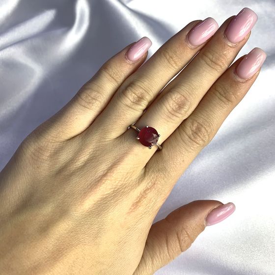 Silver ring with a ruby