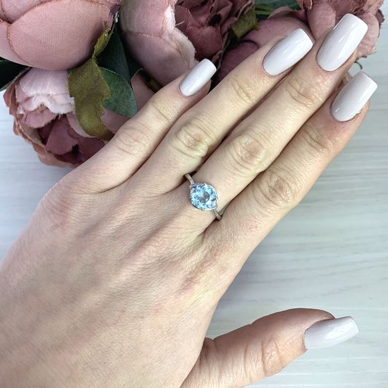 Silver ring with a topaz