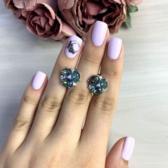 Silver earrings with a 5.268-carat mystic topaz