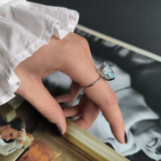 Silver ring with topaz