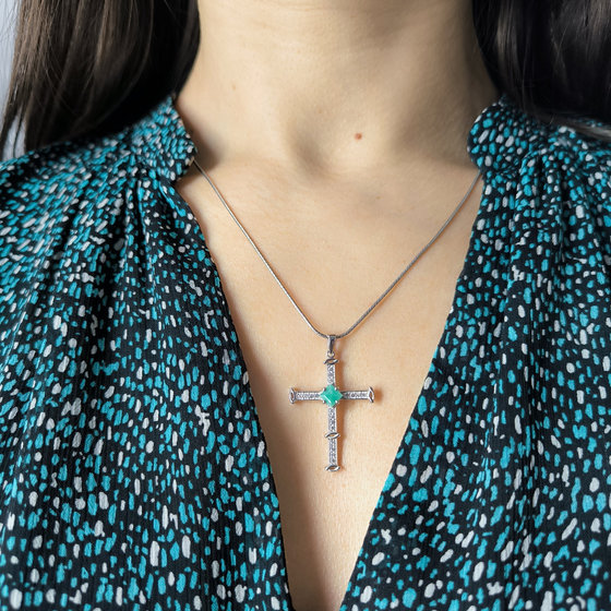 Silver cross with emerald and cubic zirconia