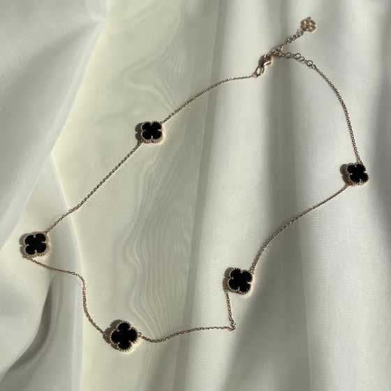 Золотое колье с ониксом