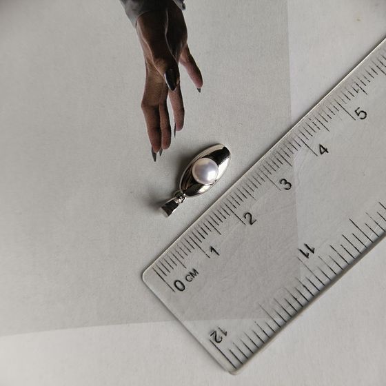 Silver pendant with pearls