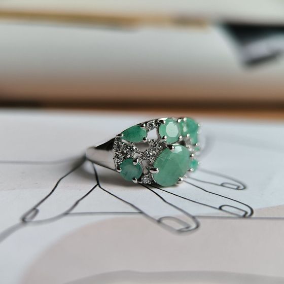 Silver ring with emerald, fianites