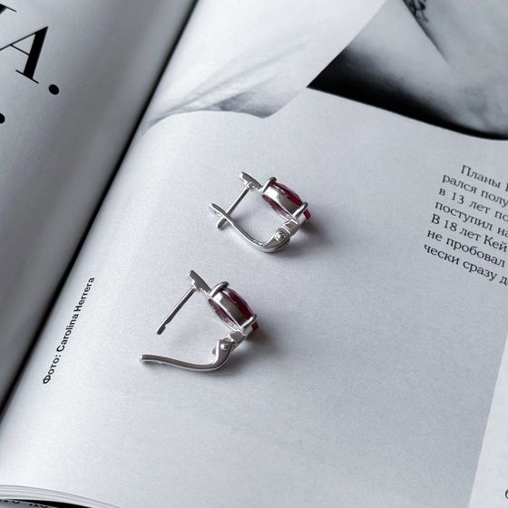Silver earrings with a 6.458-carat ruby