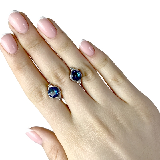 Silver earrings with a 3.763-carat mystic topaz