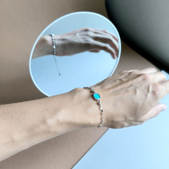 Silver bracelet with turquoise, fianites