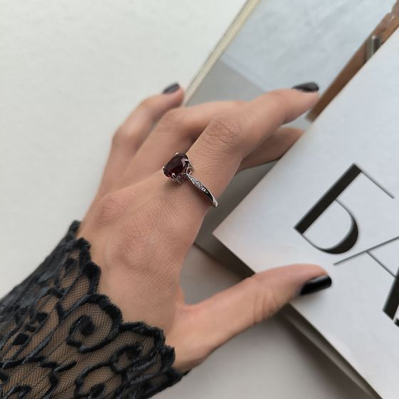 Silver ring with a garnet (nano)