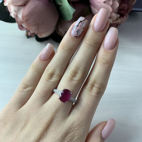 Silver ring with a ruby